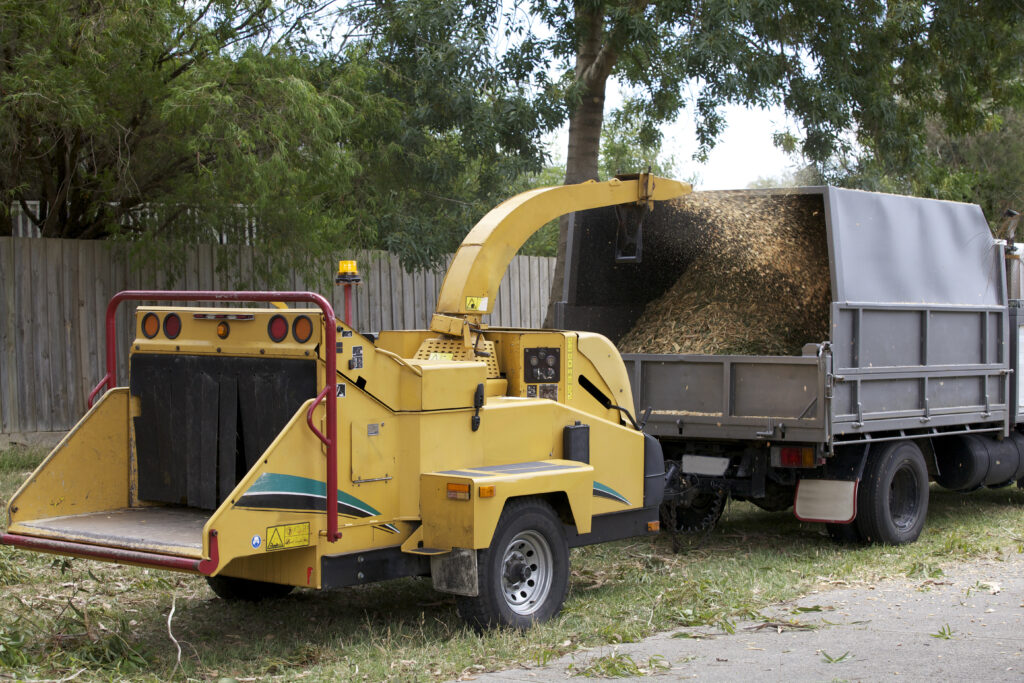 Wood chipper sprays debris